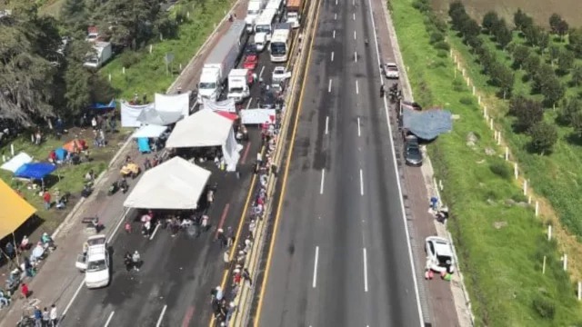 AMLO Llama a la Justicia en Conflicto por Expropiación de Terrenos en la Autopista México-Puebla