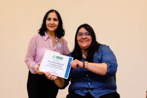 Participantes del programa de capacitación trabajando juntos para construir una Mérida más incluyente y solidaria.